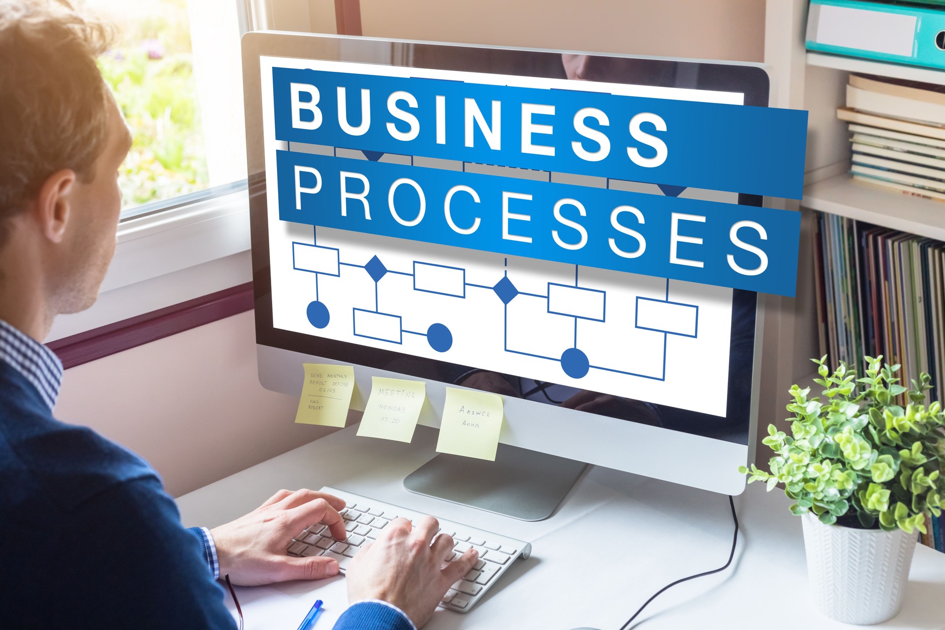 Business process management concept on computer screen with workflow automation flowchart for performance and efficiency improvement, corporate strategy, businessman working in office